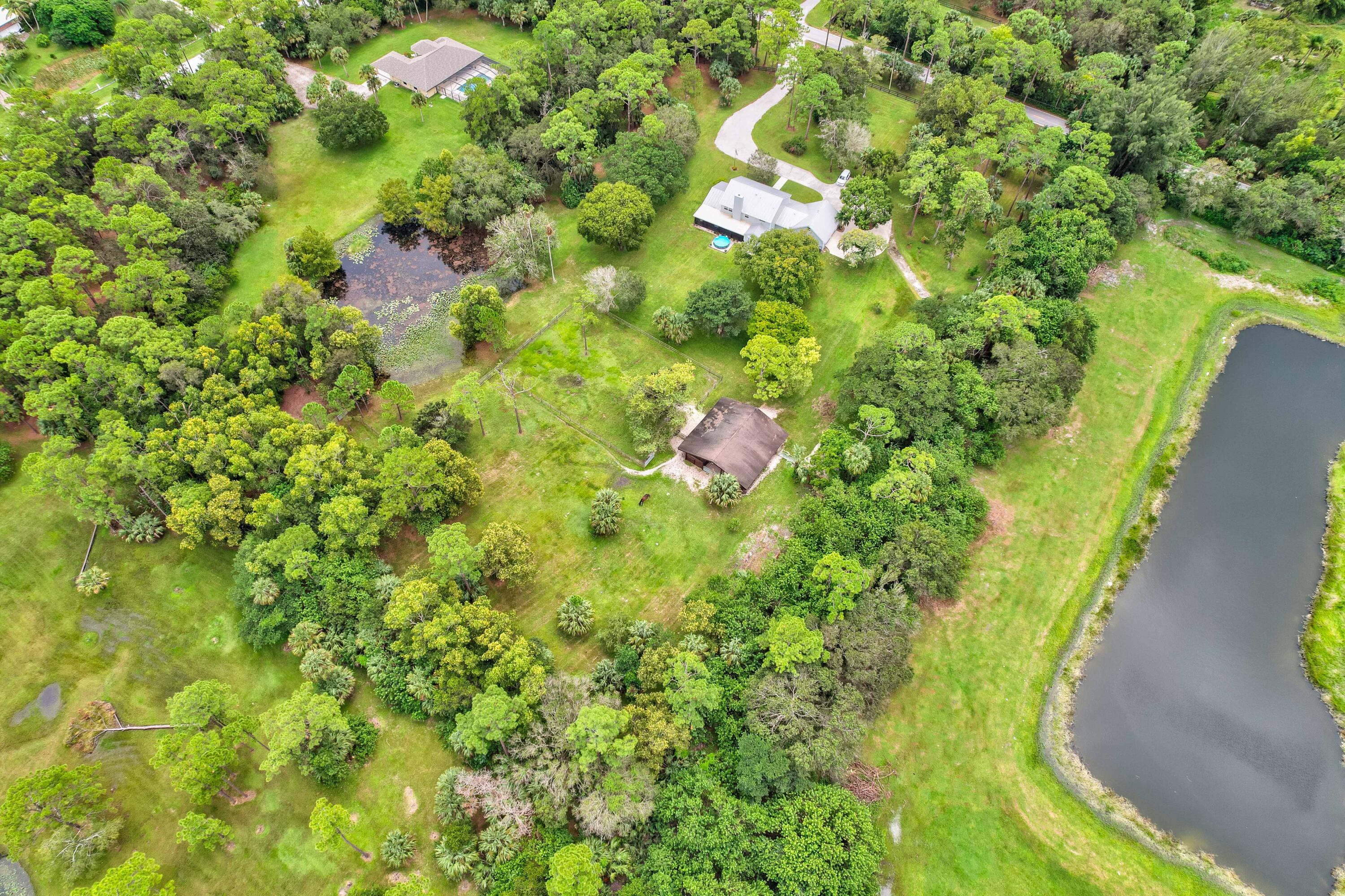 10719 Randolph Siding Road Jupiter, FL 33478 - Photo 7 of 100 05_dji_0236_37_38_39_40