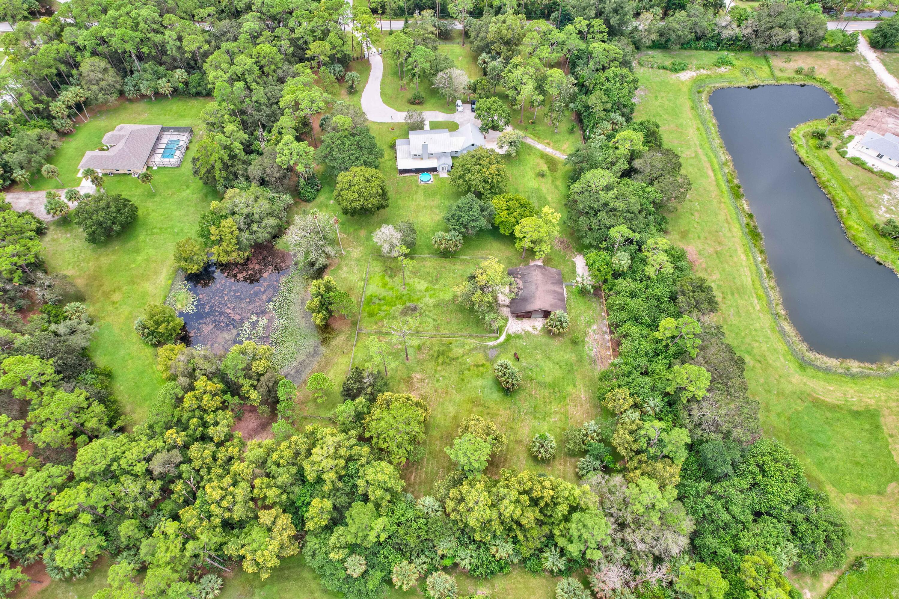 10719 Randolph Siding Road Jupiter, FL 33478 - Photo 8 of 100 06_dji_0241_2_3_4_5