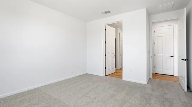 an empty room with an entryway