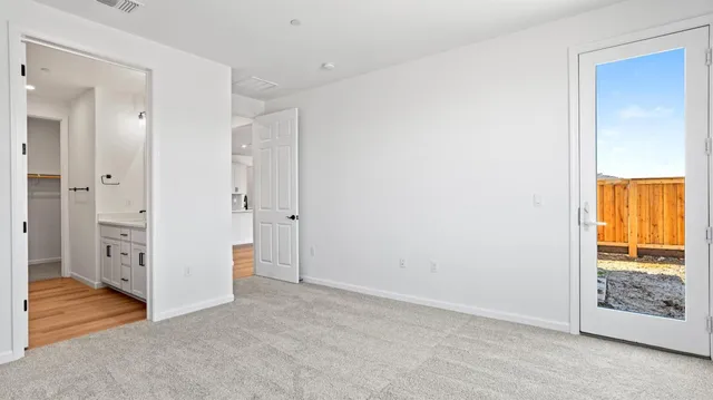 wooden floor and closet in a room