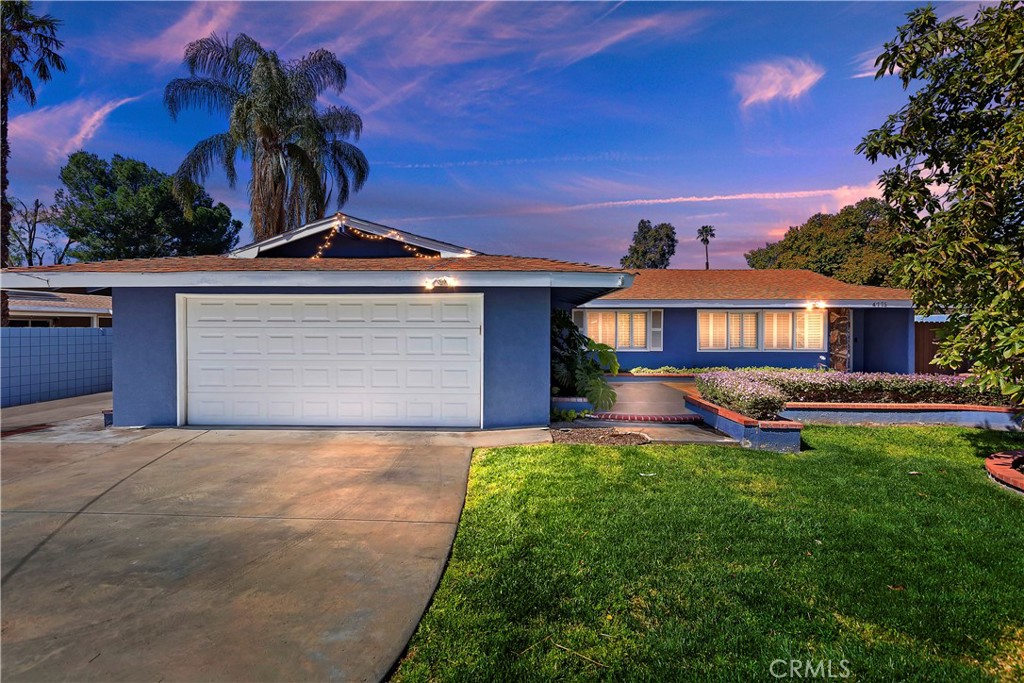 4775 Kansas Avenue Riverside, CA 92507 - Photo 1 of 1 front view of house with a yard