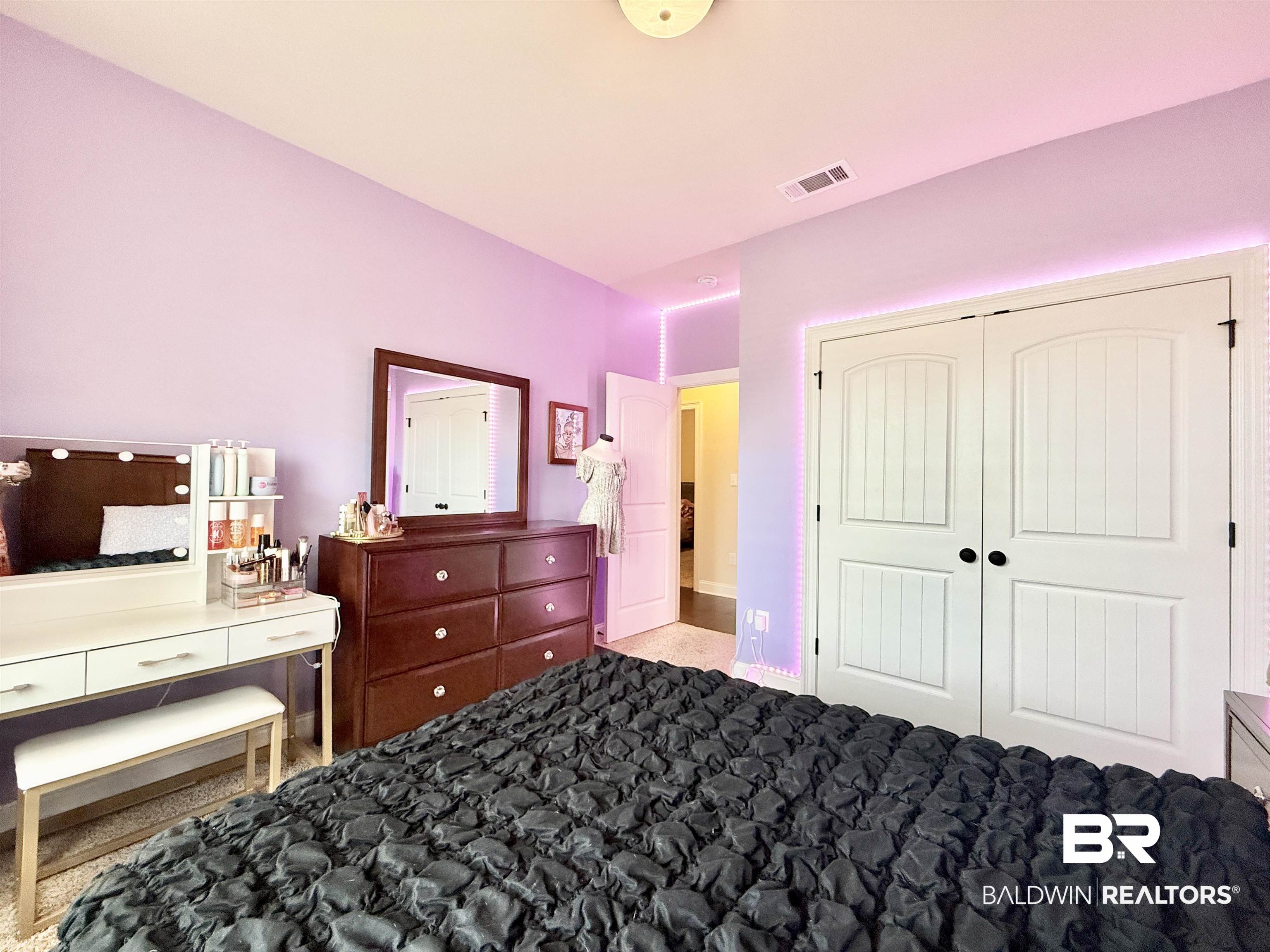 7011 Rocky Rd Loop Gulf Shores, AL 36542 - Photo 36 of 66 Bedroom featuring light colored carpet and a closet