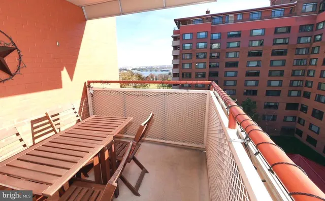 a view of balcony with furniture