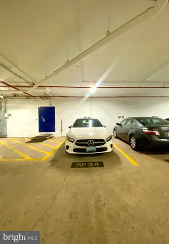 a view of a parking area with a car parked