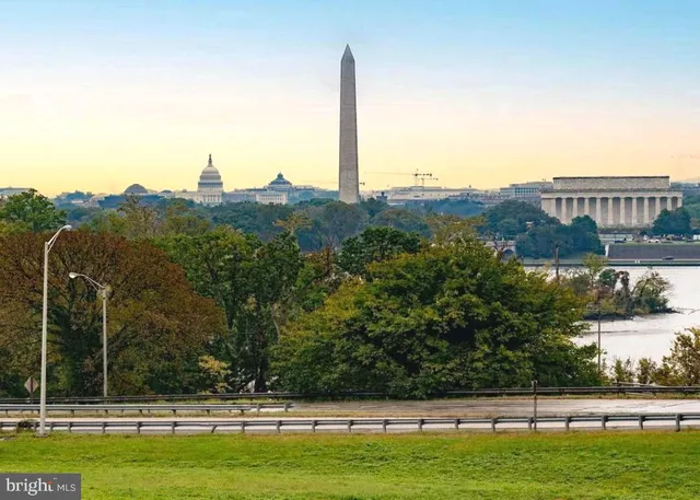 an aerial view of a house with a lake view
