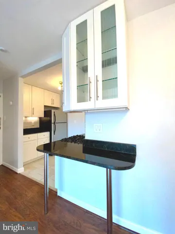 a kitchen with a sink and a window