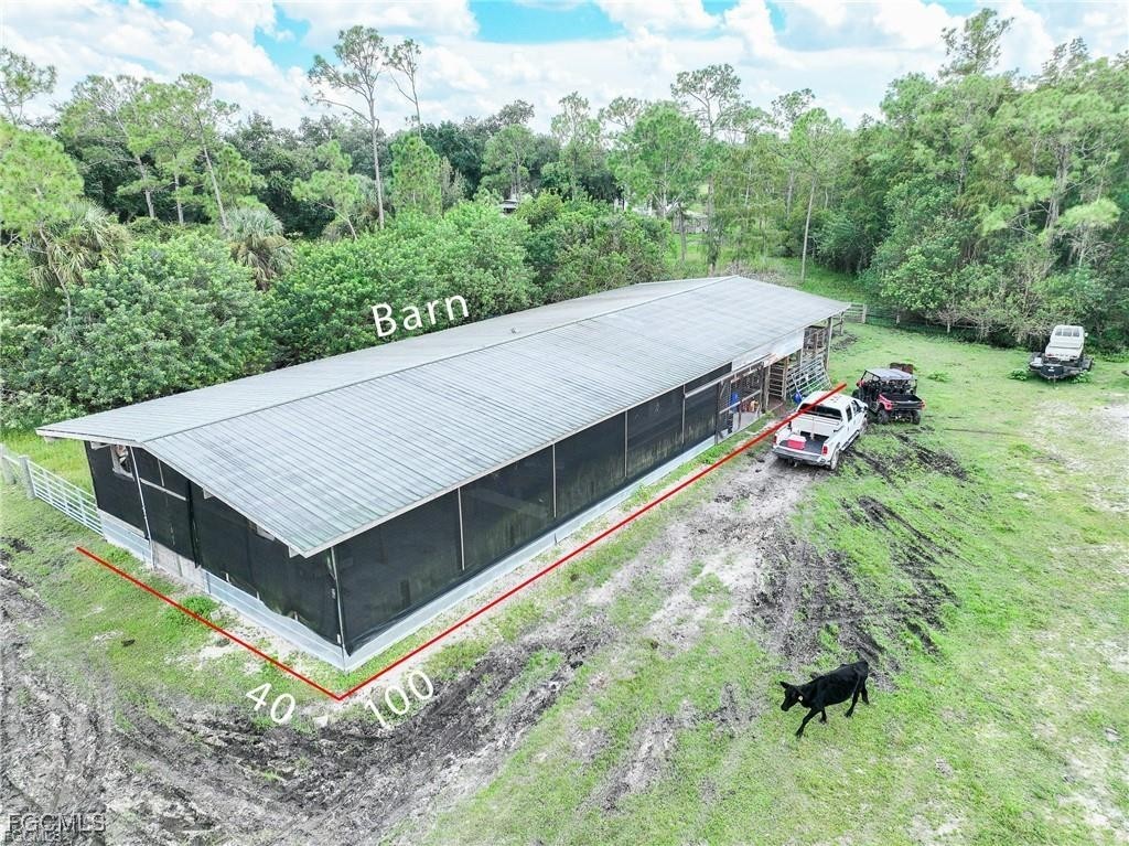 17800 Grand Chenier Road Fort Myers, FL 33913 - Photo 11 of 34 an aerial view of a house having yard