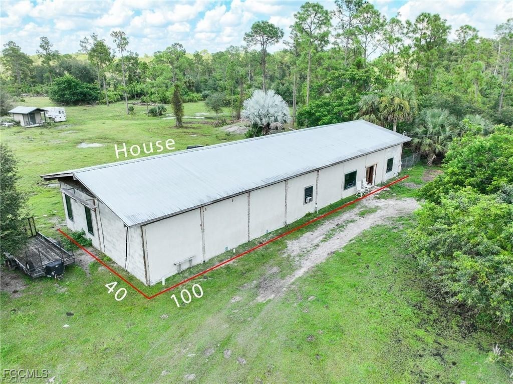 17800 Grand Chenier Road Fort Myers, FL 33913 - Photo 12 of 34 a view of a house with a yard