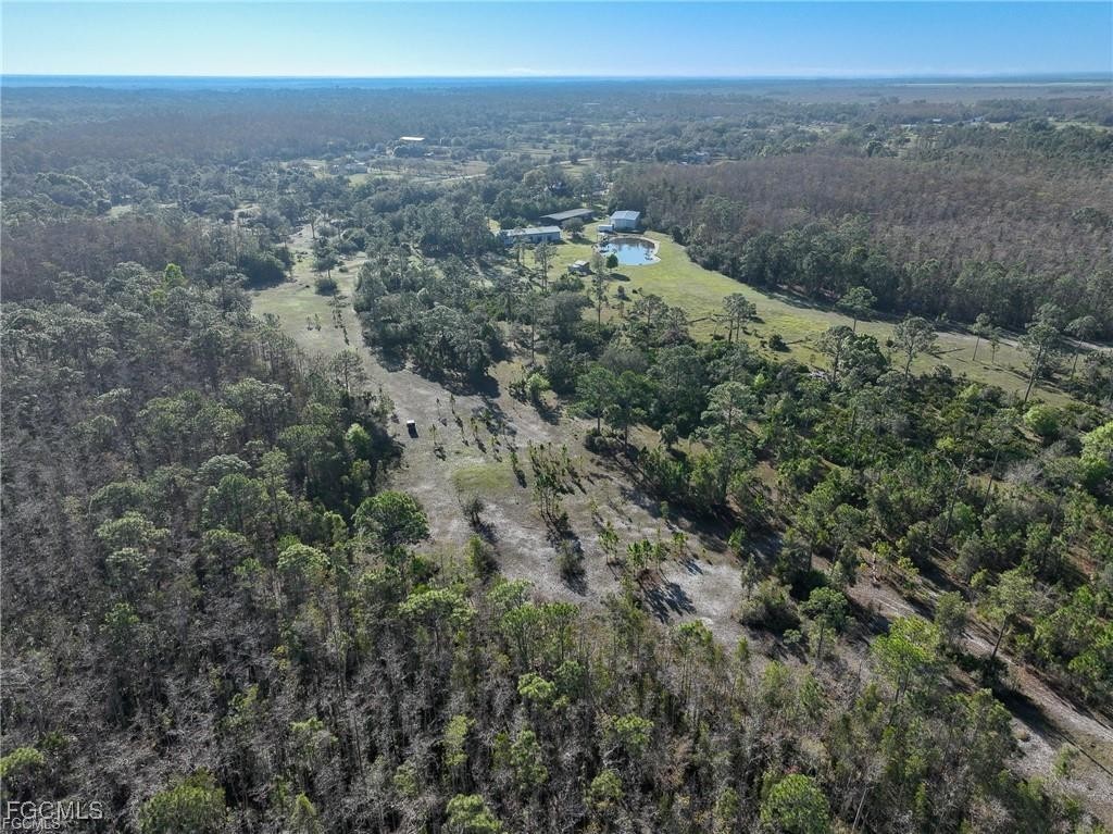 17800 Grand Chenier Road Fort Myers, FL 33913 - Photo 3 of 34 a view of a green field
