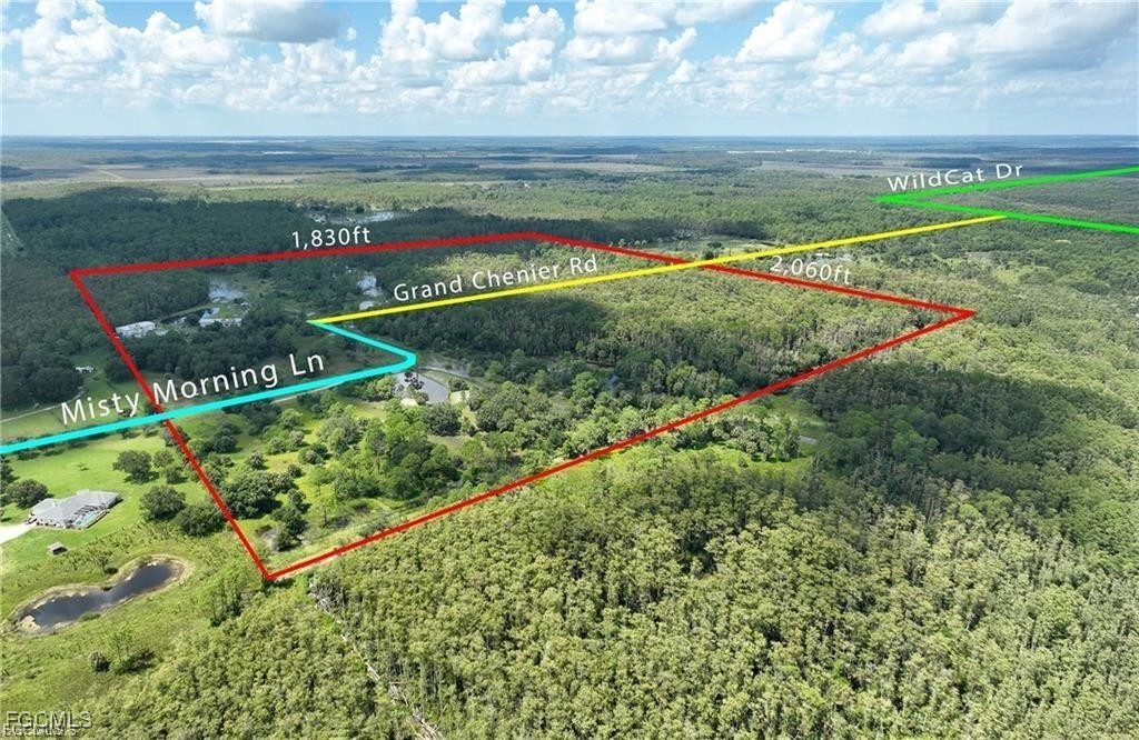 17800 Grand Chenier Road Fort Myers, FL 33913 - Photo 7 of 34 a view of a pathway with a yard