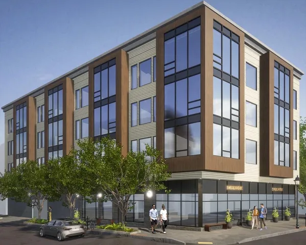 a front view of a building with street view