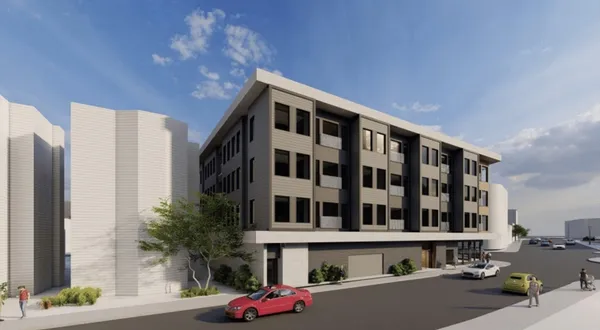 a front view of a building with street view