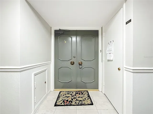 a bathroom with a granite countertop shower