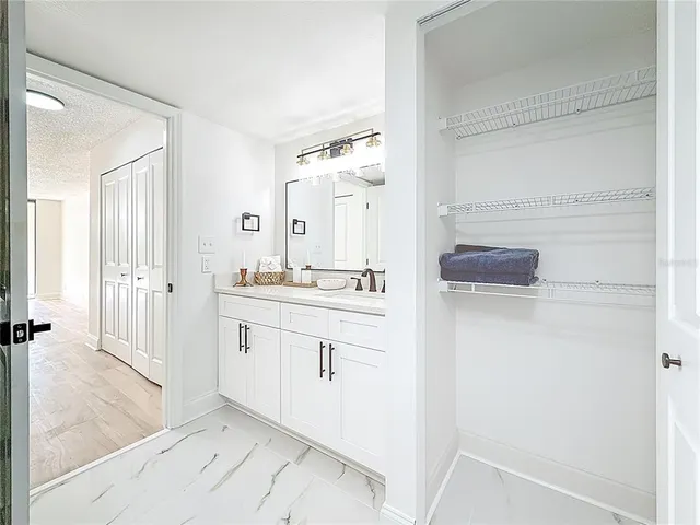 a view of balcony with wooden floor