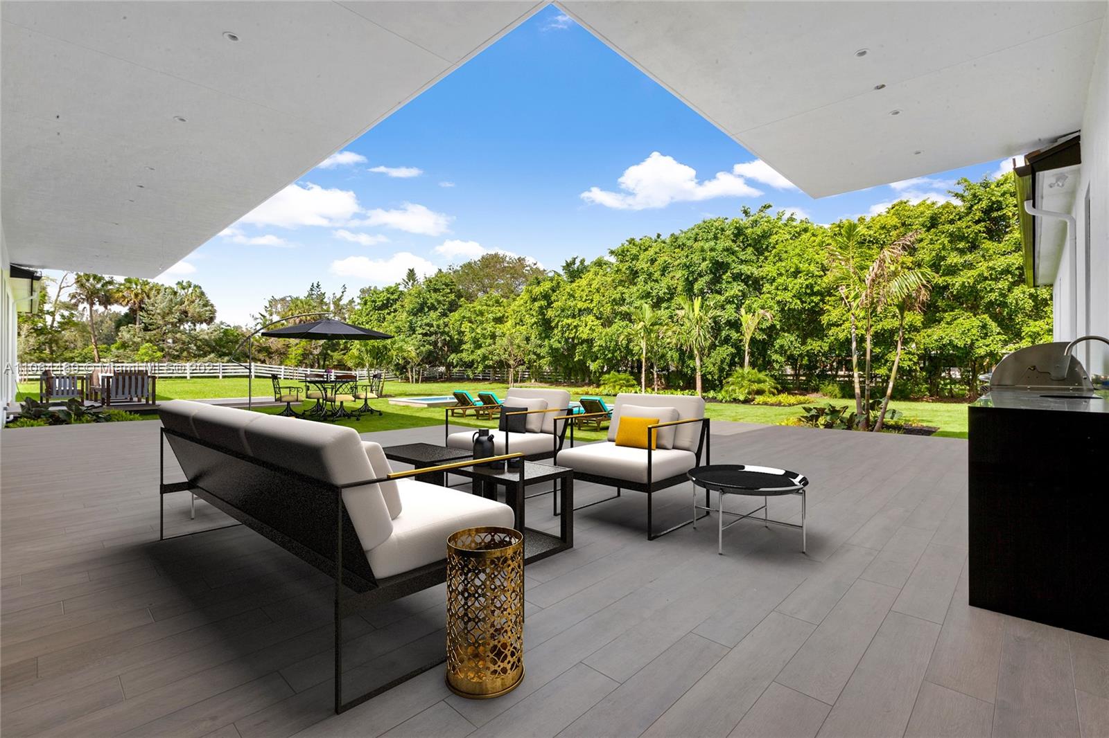 a outdoor living space with furniture and garden view