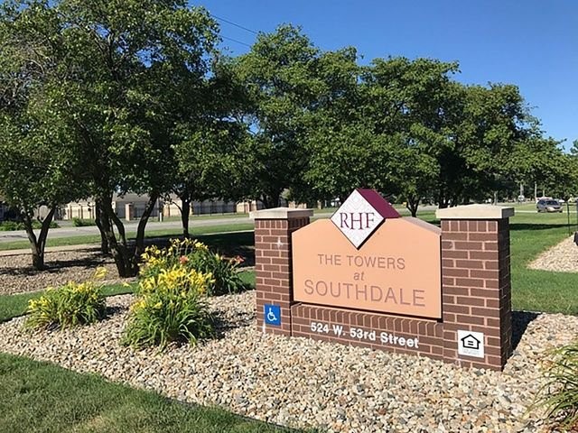 524 West 53rd Street Anderson, IN 46013 - Photo 4 of 11 a sign on the side of the road