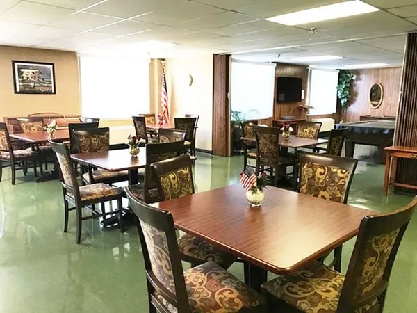 a view of a dining room with furniture