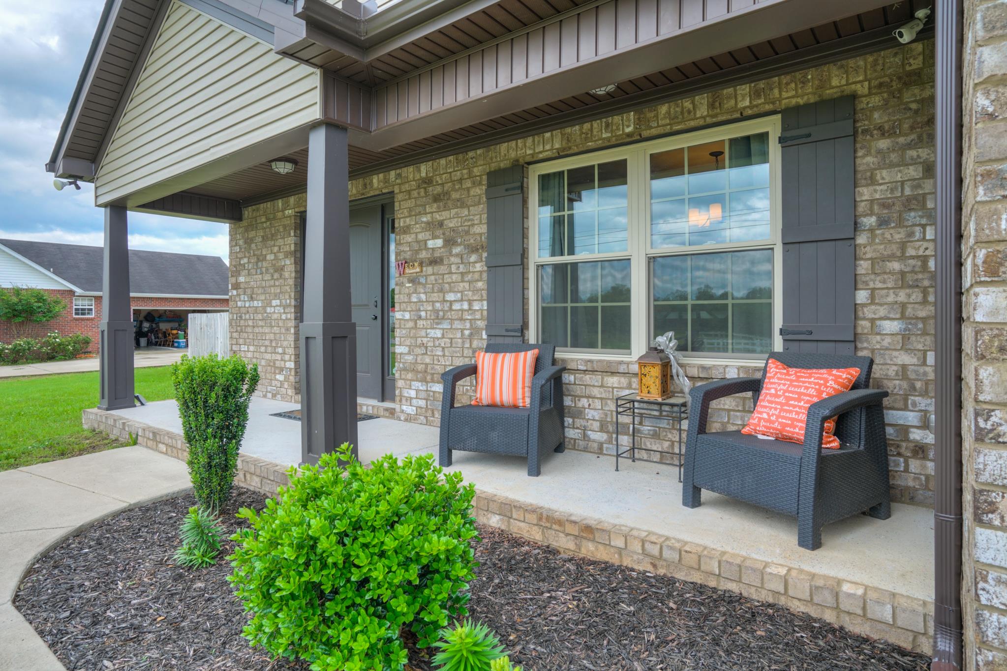 5051 Epps Mill Road Christiana, TN 37037 - Photo 3 of 26 Enjoy the rocking chair front porch.