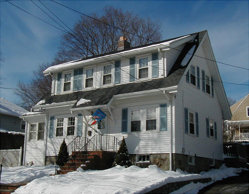 54 Edgehill Road Braintree, MA 02184 - Photo 1 of 1 a front view of a house with a tree