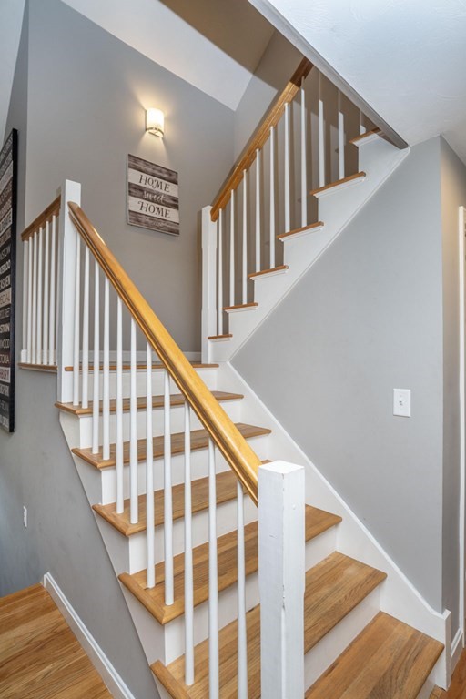 113 Pierce Street Rochester, MA 02770 - Photo 13 of 40 a view of staircase with wooden floor and stairs