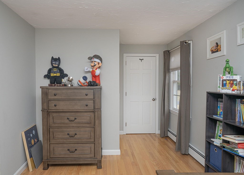 113 Pierce Street Rochester, MA 02770 - Photo 17 of 40 a view of a livingroom with toys