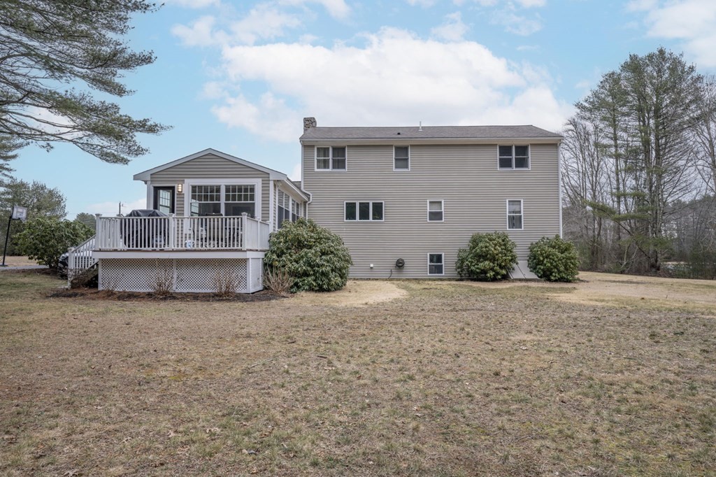 113 Pierce Street Rochester, MA 02770 - Photo 6 of 40 a front view of a house with a yard