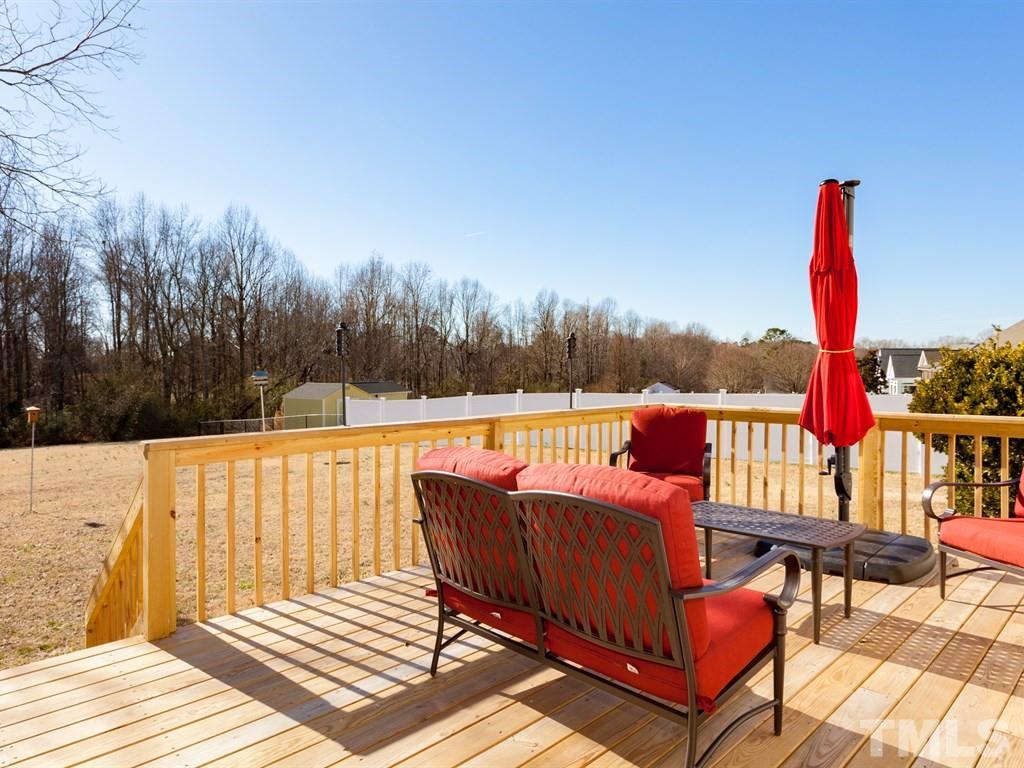 1017 Newburgh Circle Raleigh, NC 27603 - Photo 22 of 25 Recently added large deck, overlooking spacious backyard