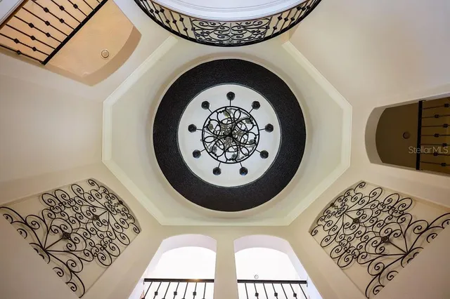 a large kitchen with stainless steel appliances lots of counter top space