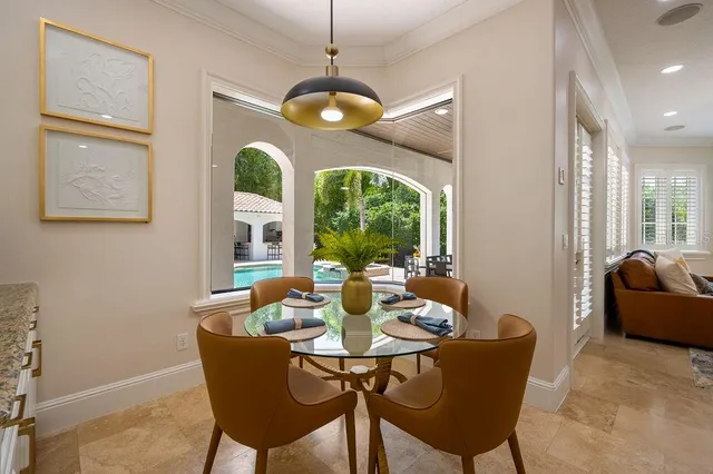 a view of a house with a yard patio and a garden