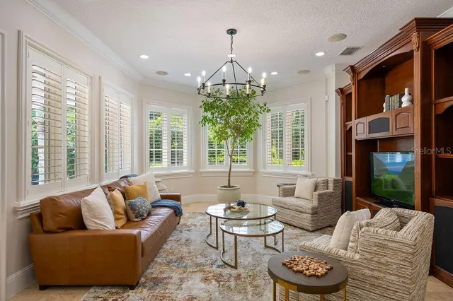 a view of a lake with houses in the back