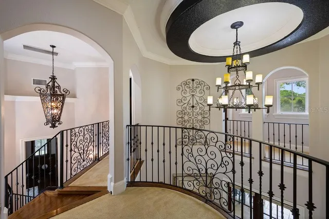 an aerial view of residential house with outdoor space and swimming pool