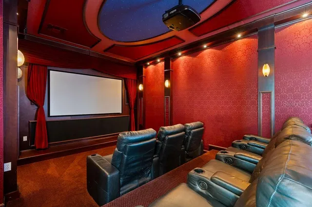 an aerial view of residential house with outdoor space and lake view