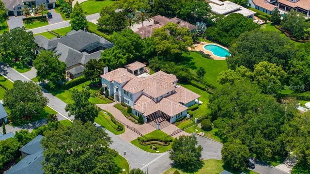 a view of a dining room with furniture and a window