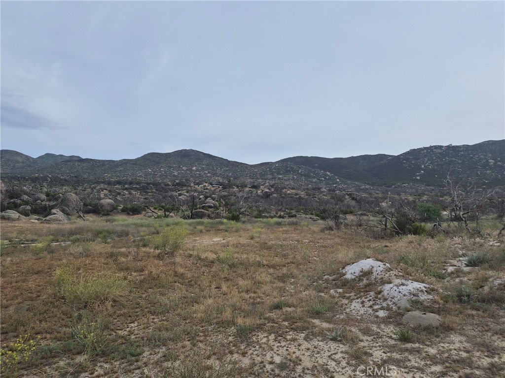 1 Tule Peak Road Aguanga, CA 92536 - Photo 26 of 28 a view of a large mountain with mountains in the background