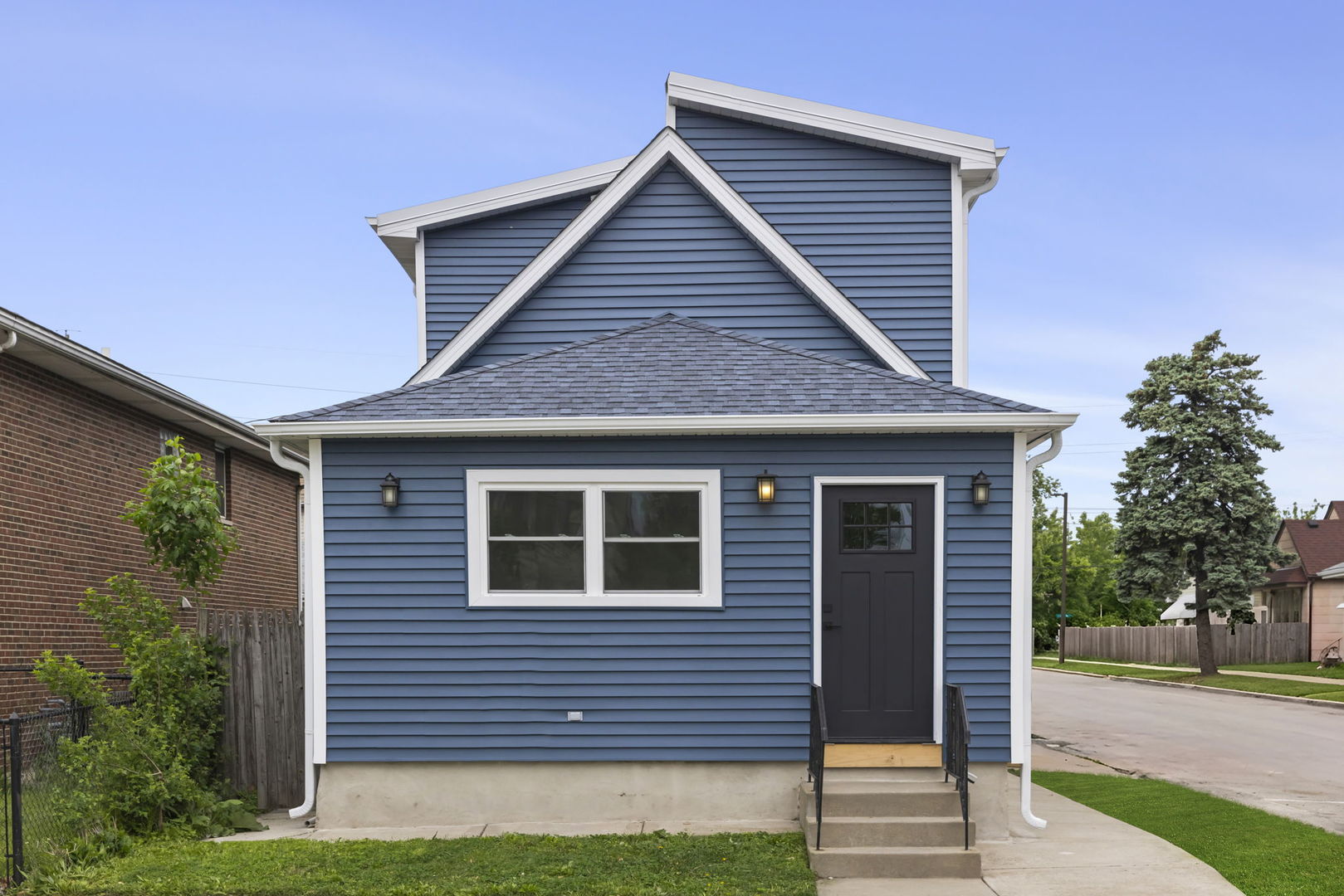 7600 West 60th Street Summit, IL 60501 - Photo 2 of 22 a front view of a house with a yard