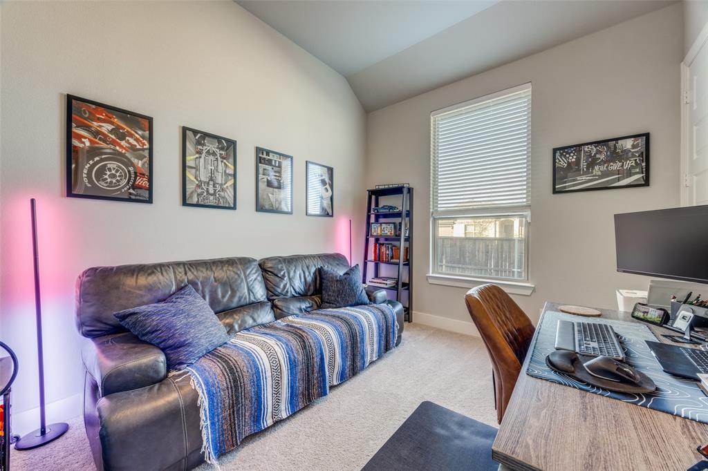 817 Markham Drive Anna, TX 75409 - Photo 21 of 27 a living room with furniture a computer on desk and a window
