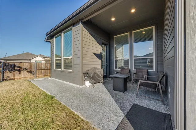 a outdoor space with lots of tables and chairs