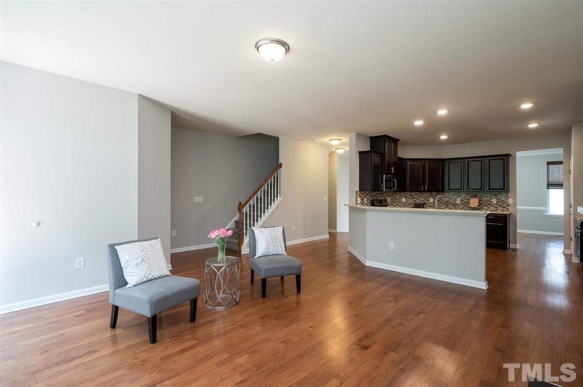 715 Edgewater Ridge Court Apex, NC 27523 - Photo 13 of 29 Beautiful hardwoods adorn the entire 2nd floor.