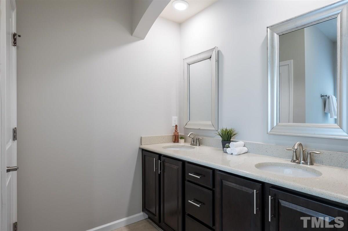 715 Edgewater Ridge Court Apex, NC 27523 - Photo 19 of 29 This master bath has dual vanity, water closet AND linen closet!