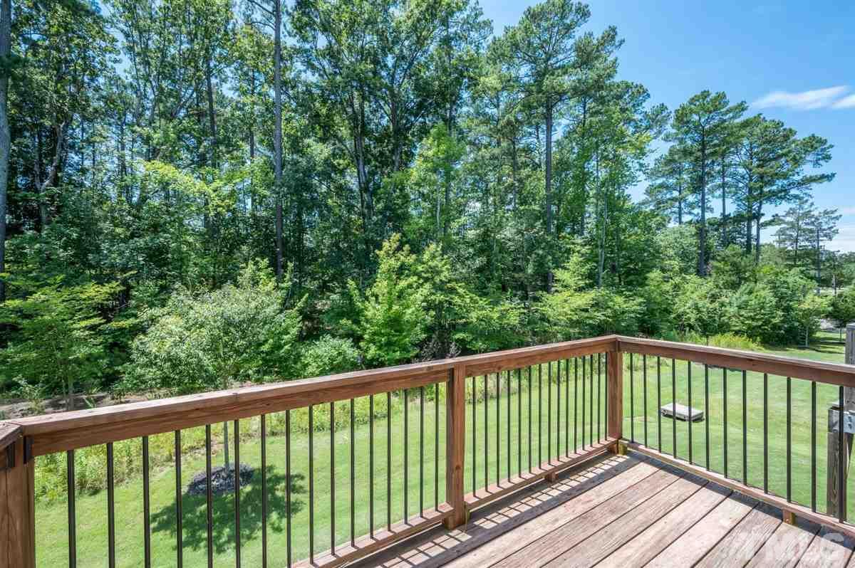 715 Edgewater Ridge Court Apex, NC 27523 - Photo 29 of 29 View from the 2nd floor deck. This home backs to the trees!
