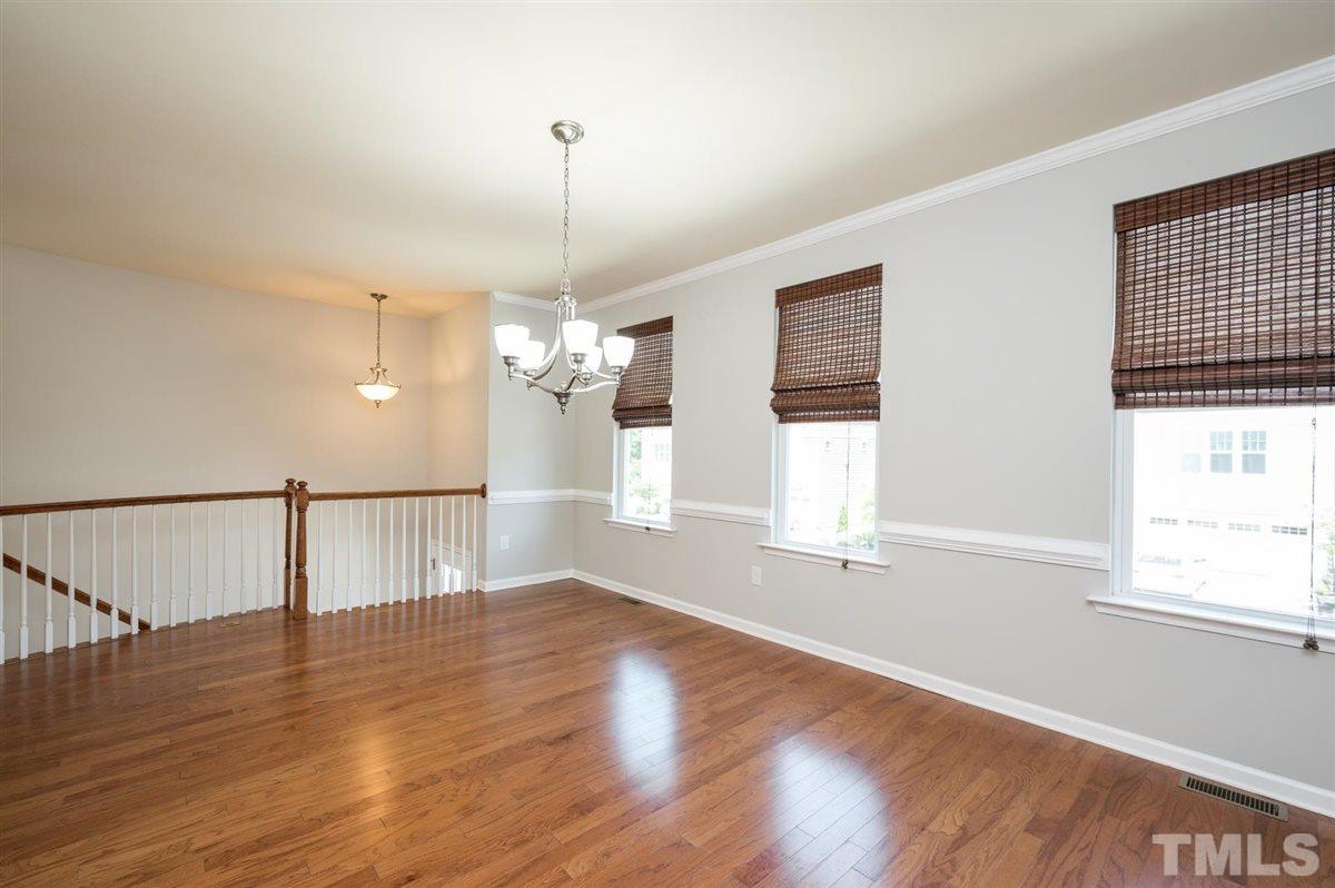 715 Edgewater Ridge Court Apex, NC 27523 - Photo 4 of 29 Plenty of space here for your extended table and side cabinet. Enjoy hosting family and friends!