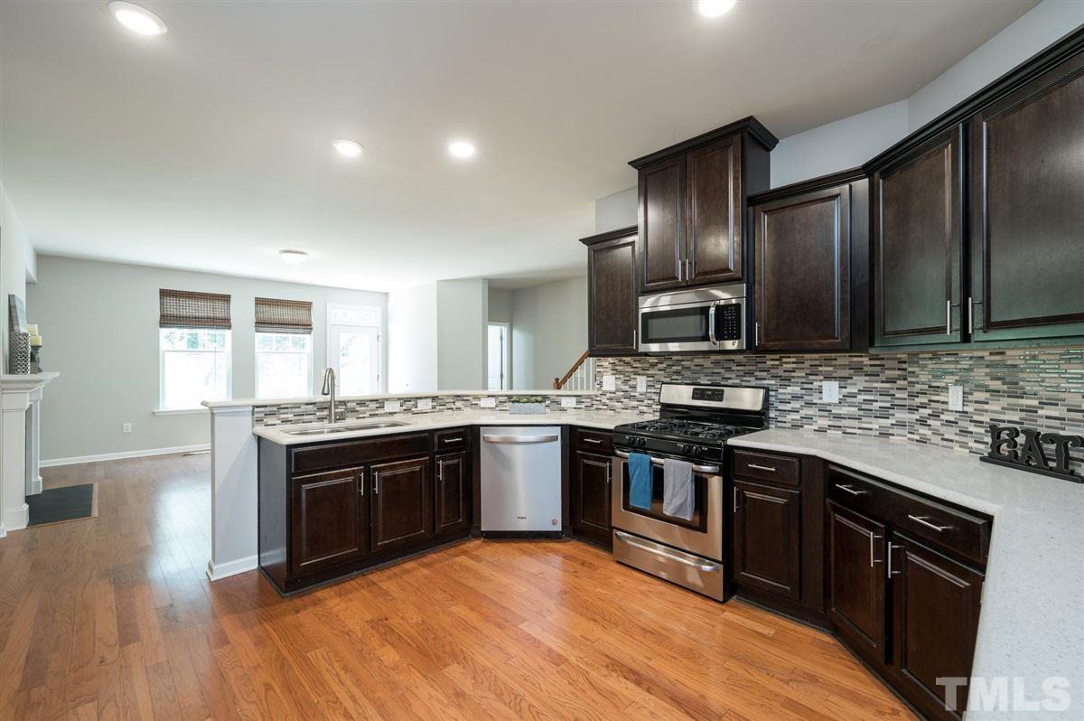 715 Edgewater Ridge Court Apex, NC 27523 - Photo 6 of 29 Spacious kitchen with many upgrades!