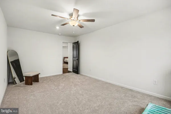 a view of a livingroom with a workspace