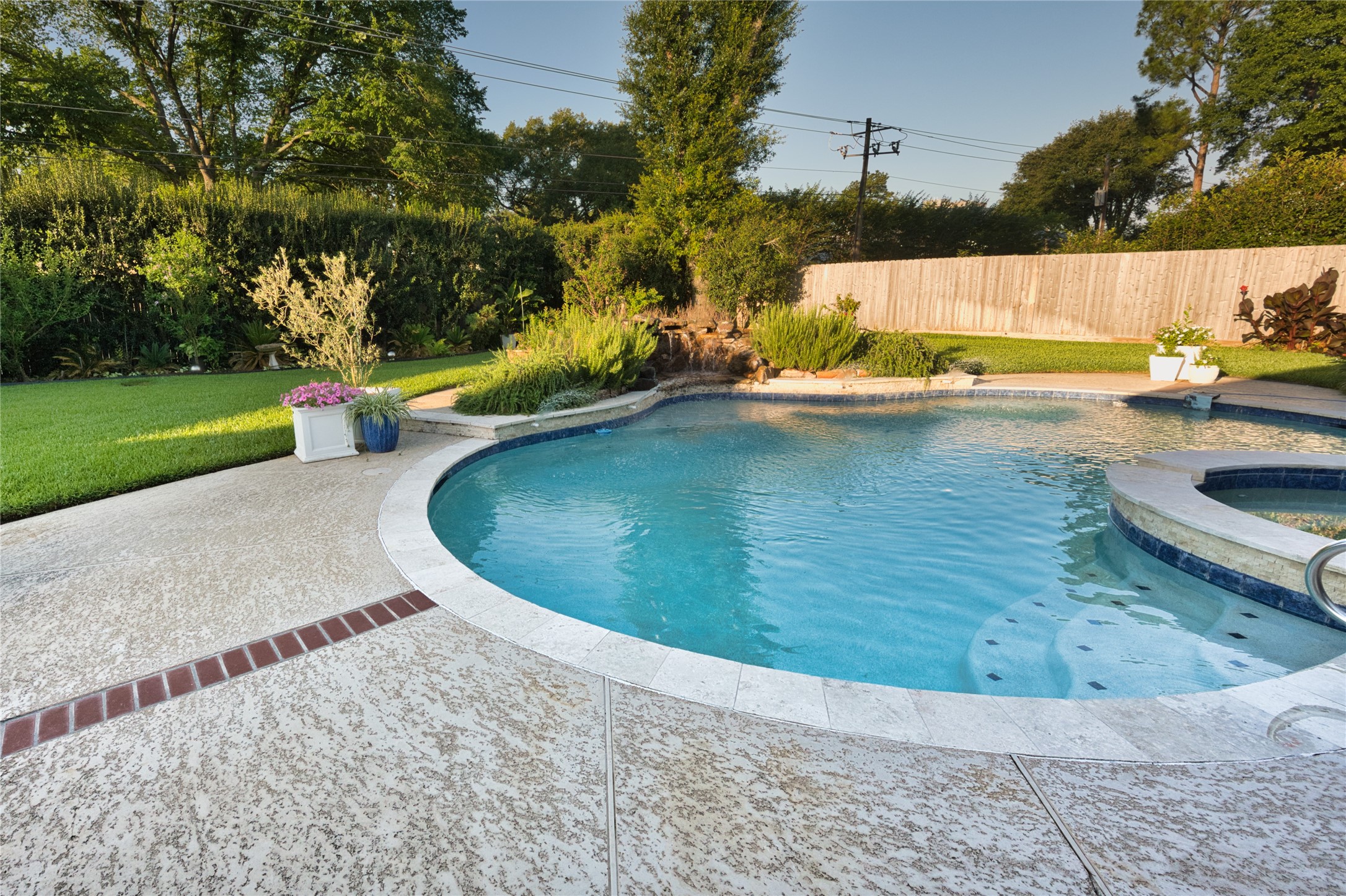 615 Timber Circle Houston, TX 77079 - Photo 13 of 16 a view of a swimming pool with a yard and sitting area