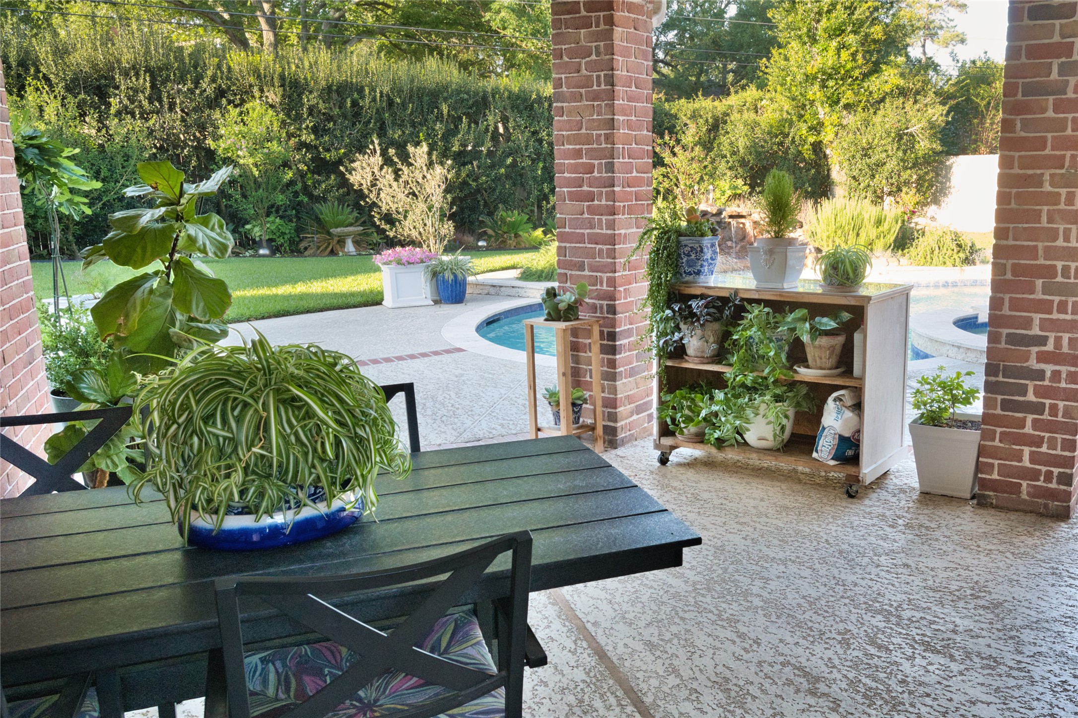 615 Timber Circle Houston, TX 77079 - Photo 15 of 16 a view of a backyard with sitting area