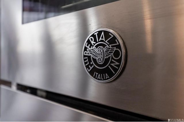 a close up of a sign on a oven