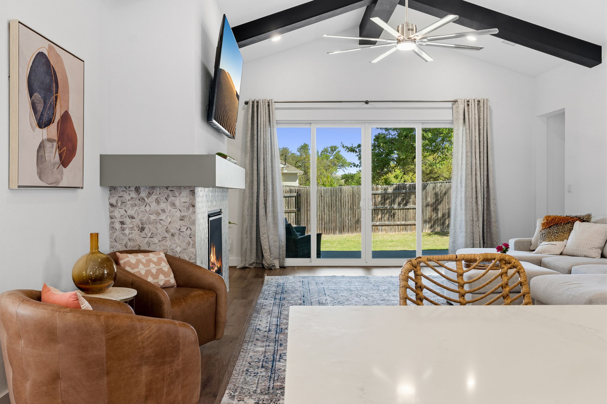 306 Bridge Water Loop Dripping Springs, TX 78620 - Photo 11 of 40 a living room with furniture and a large window