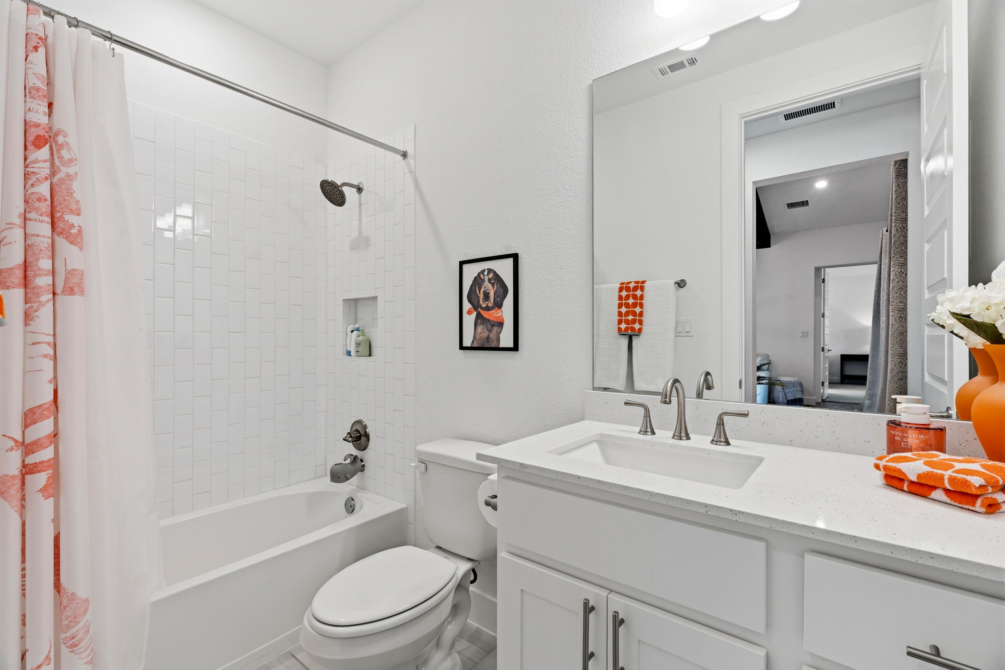 306 Bridge Water Loop Dripping Springs, TX 78620 - Photo 23 of 40 a bathroom with a sink a toilet and shower