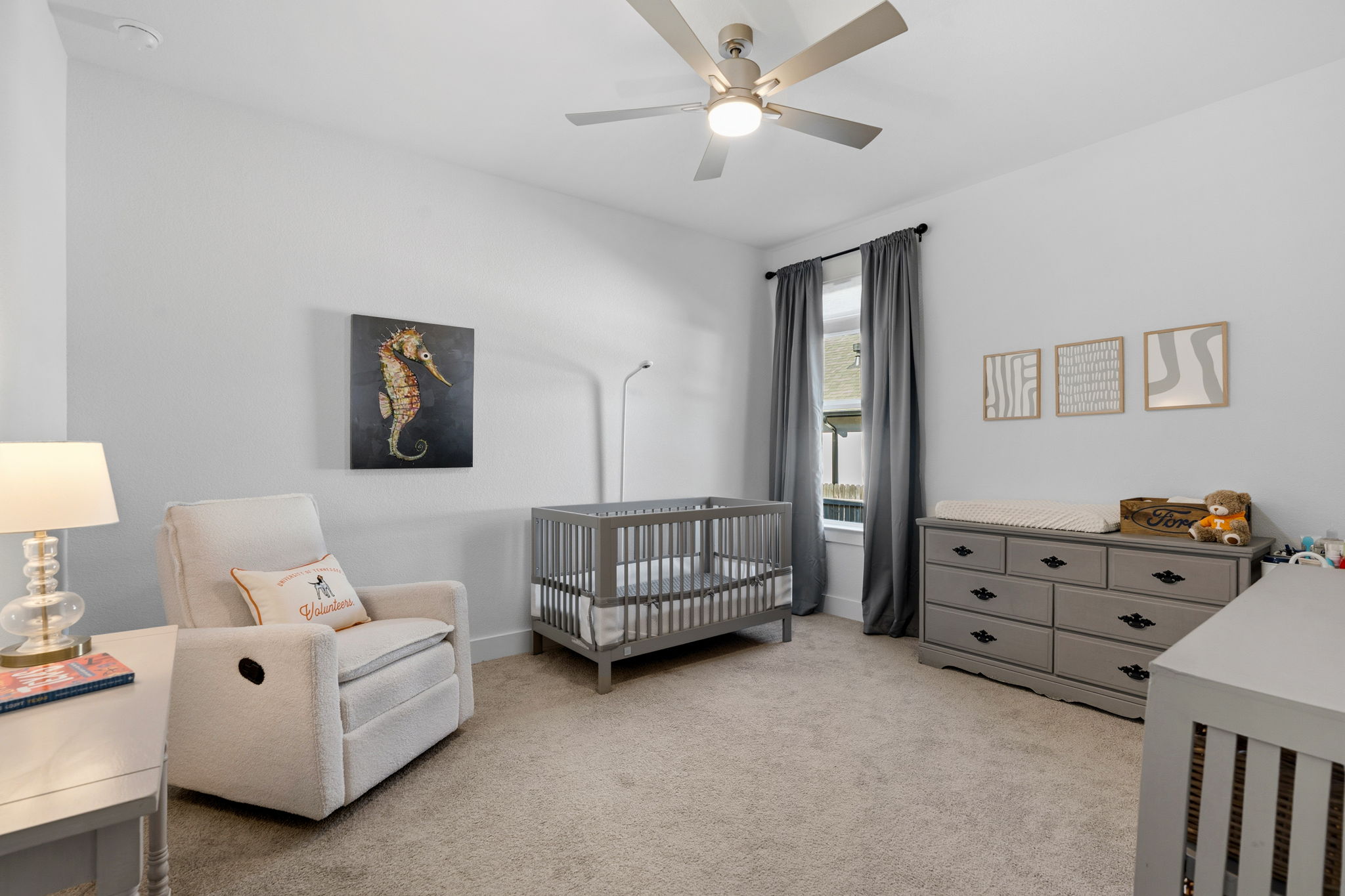 306 Bridge Water Loop Dripping Springs, TX 78620 - Photo 24 of 40 a living room with furniture and a baby crib