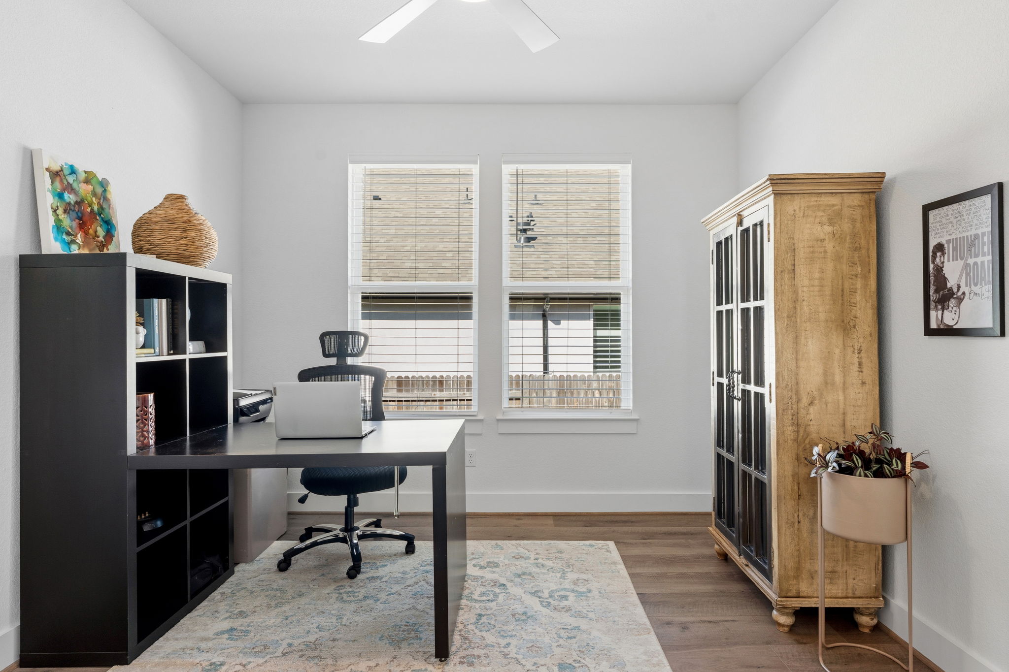 306 Bridge Water Loop Dripping Springs, TX 78620 - Photo 27 of 40 a view of a workspace with furniture and a window